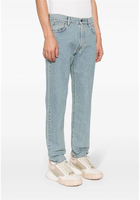 Jeans dritti con applicazione Moschino | ZRA035220220294